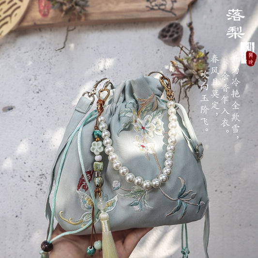 Bundle mouth tassel small bag