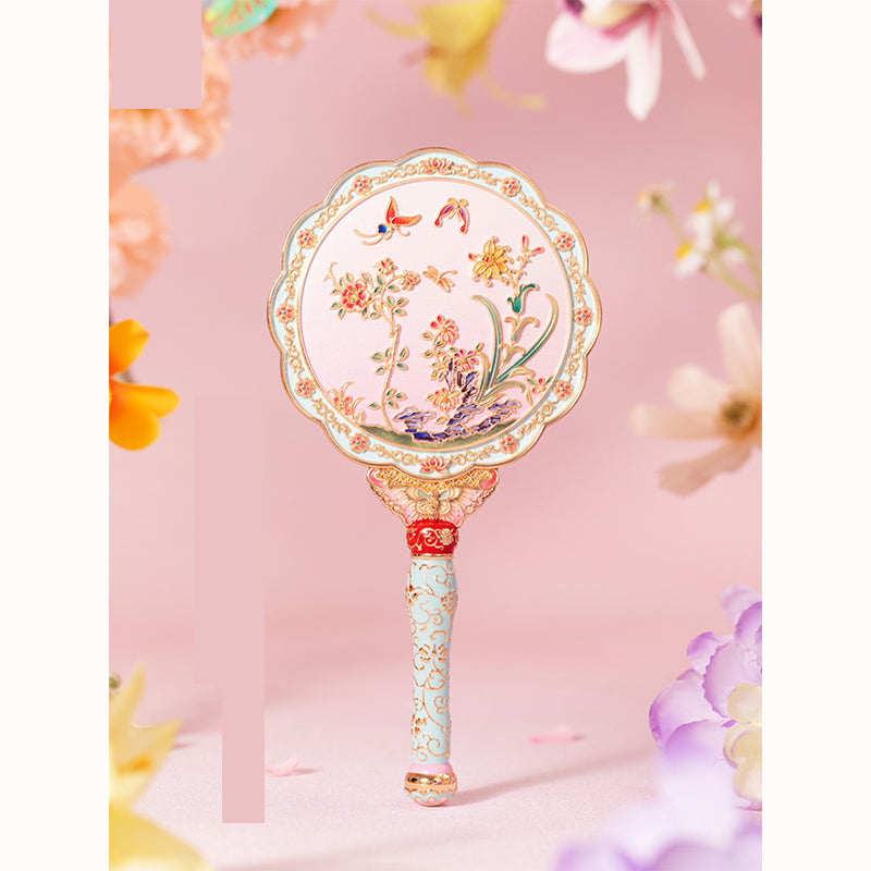 Butterfly holding mirror