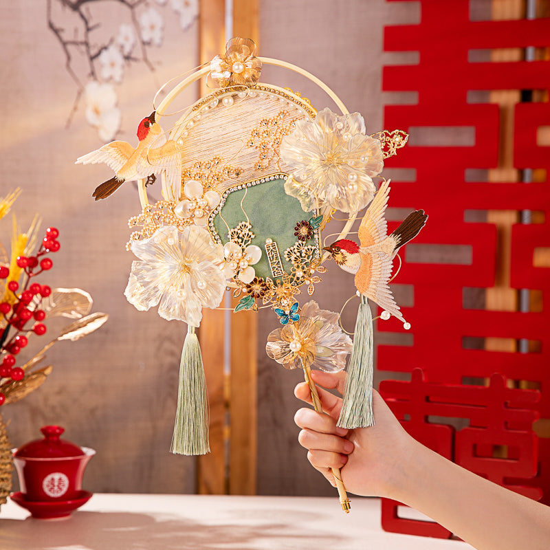 Magpies celebrate with joy wedding fan